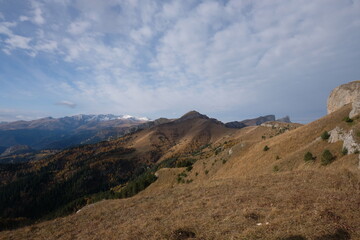 Autumn in mountains, outdoor tracking hiking in mountains, rocks alpinism traveling, climbing landscapes, autumn mood in countryside, mountain environment, travel and hiking camping