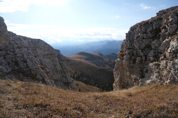 Autumn in mountains, outdoor tracking hiking in mountains, rocks alpinism traveling, climbing landscapes, autumn mood in countryside, mountain environment, travel and hiking camping