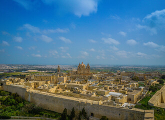 Fototapeta premium Aerial panorama view of the town of Mdina fortress in Malta also called Silent city. Ancient medieval walled city - the capital city of Malta in medieval times