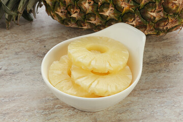 Marinated pineapple rings in the bowl