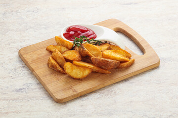 Fried rustic potato with tomato ketcup
