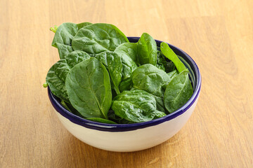 Fresh green spinach leaves in the bowl