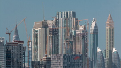 Rows of skyscrapers in financial district of Dubai aerial timelapse.