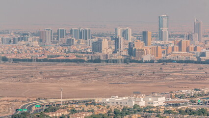 Aerial view of Jumeirah Village Circle district timelapse