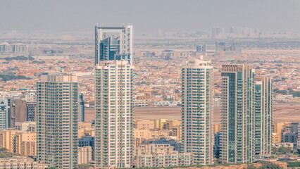 Fototapeta na wymiar Aerial view of greens district area timelapse from Dubai marina.