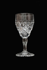crystal glass on black background. soviet fashion for crystal tableware