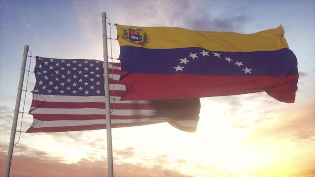 Venezuela and United States flag on flagpole. Venezuela and USA waving flag in wind. Venezuela and United States diplomatic concept
