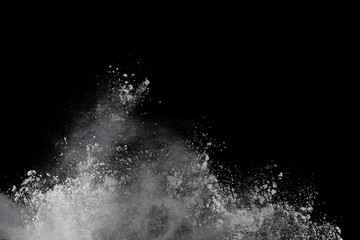 Obraz premium White powder explosion on black background. Colored cloud. Colorful dust explode. Paint Holi.