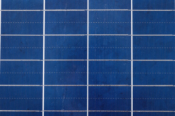 Overhead full frame shot of white grid patterns on blue solar panel