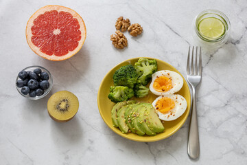 Minimalistic photo of healthy breakfast with foods to speed up metabolism. High quality photo