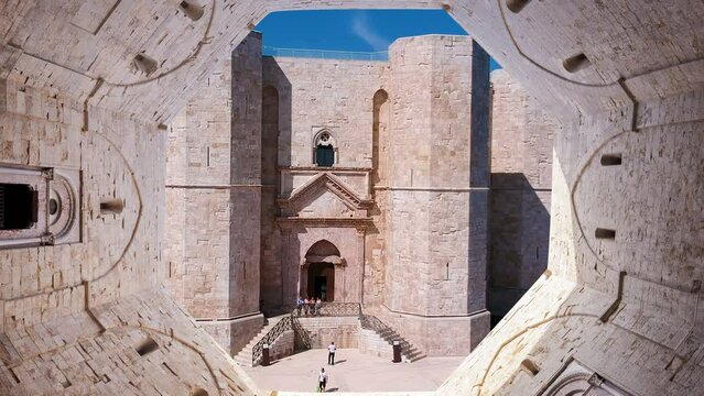 Corato, Italy - 16 september 2018: Aerial drone footage view  tourist of Castel Del Monte in Puglia in Italy.Scene seen from the sky portion of the octagonal courtyard of the castle