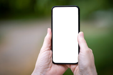 Hand holding phone without screen