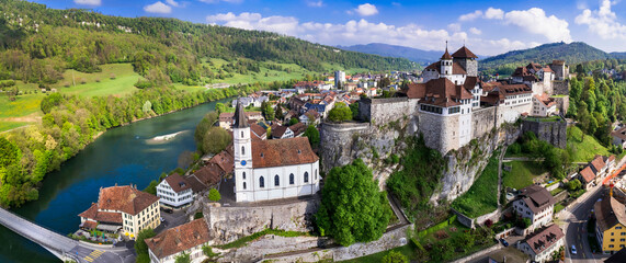 Fototapeta Switzerland travel and landmarks. Aarburg  aerial view.  old medieval town with impressive castle and cathedral over rock. Canton Aargau, Bern province obraz