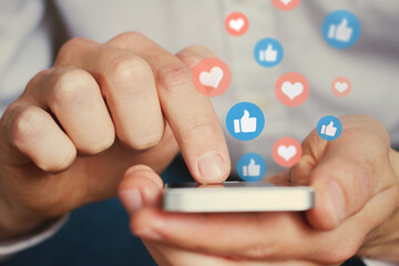 Social media concept on smartphone. Like icons.