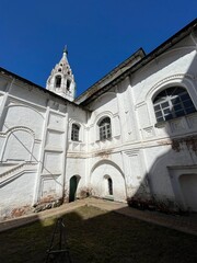 Beautiful orthodox church with white walls, blue sky background