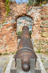 View of a muzzle-loading culverin of the seventeenth century in the Priamar fortress, Savona, Liguria, Italy