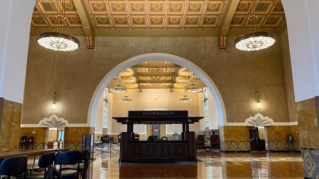 LOS ANGELES, CA, SEP 2021: view of information kiosk at Union Station in Downtown with ornate ceiling overhead