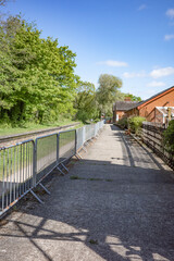 Reepham, Norfolk, UK – May 08 2022. Old and disused railway platform on the Marriot’s Way, a railway line of yesteryear no longer in use