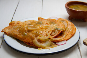 Basket tacos with green sauce. Mexican food