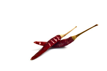 Dried red hot peppers on white