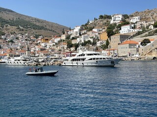 Fototapeta na wymiar Yacht in Greek Harbor