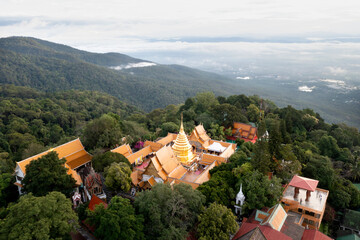 Aerial view at Wat Phra That Doi Suthep temple on the Cloudscape in Chiangmai, Thailand.