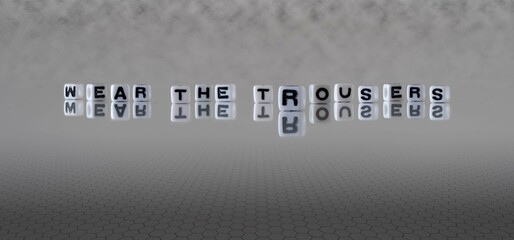 wear the trousers word or concept represented by black and white letter cubes on a grey horizon...