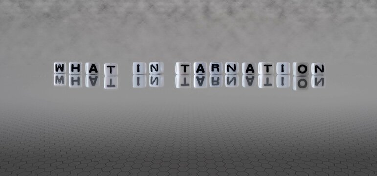 what in tarnation word or concept represented by black and white letter cubes on a grey horizon background stretching to infinity
