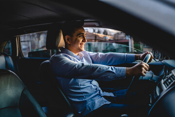 One man drive car young adult businessman smiling happy male person wearing blue shirt going to work alone in sunny day real people copy space - obrazy, fototapety, plakaty
