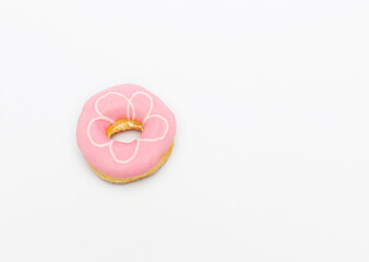 pink glazed donut isolated on white background