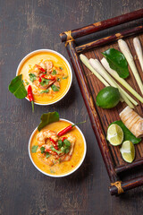 Tom Yam Kung ,Prawn and lemon soup with mushrooms, thai food in two white bowl top view.