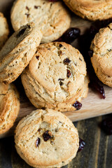 delicious dried cookies made of high-quality flour with dried red cranberries on the table