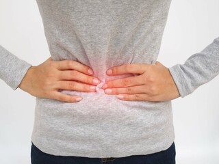 Woman with stomach pain causes of abdominal pain include inflammatory bowel disease-IBD. stomach...