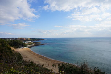 clouds and sun and beach