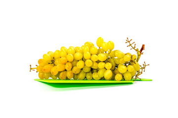 Ripe large bunch of grapes of sultana on white background