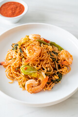 Stir-fried instant noodles sukiyaki with shrimps