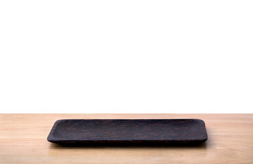 Empty sushi bamboo tray board on wood table white background. Bamboo products that have been processed into trays for use in the kitchen. Top view of plank wood for graphic stand design product.