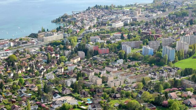 Aerial Over Residential Neighborhood Of Morges Municipality With Lake Geneva In Vaud, Switzerland.