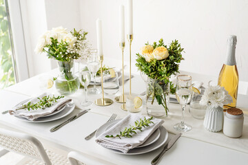 The wedding decor. Wedding teble decoration with white roses