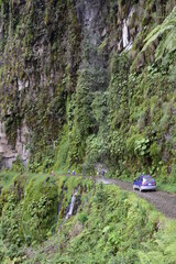 The car on the Death road, Yungas North Road between La Paz and Coroico, Bolivia