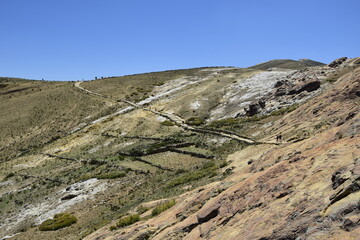 Stone sidewalk to the Chincana ruins on Isla Del Sol (Island of the Sun) on the Titicaca lake. Bolivia. . South America