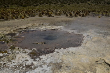 photo of colourful water of river in wilderness of Parque Nacional Sajama in Bolivia, South America