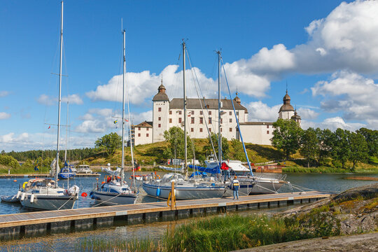 Sailboats at a jetty at Lacko castle in Sweden