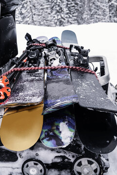  skis on snowmobile. freeride, winter day in the mountains