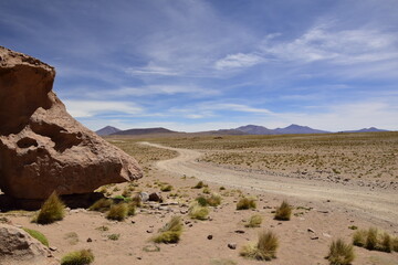 Brown Rocks. Off-road tour on the salt flat Salar de Uyuni in Bolivia