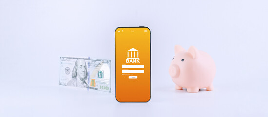 Online payment. Mobile phone with internet online bank app. Piggy bank with hundred dollar bill on white background. Online wallet save money. 