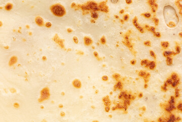 Pan fried pancake as a background.