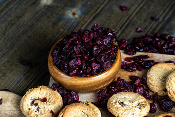 delicious dried cookies made of high-quality flour with dried red cranberries on the table