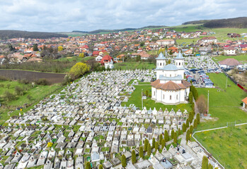 The Orthodox Church and the cemetery in Reghin - Romania seen from above