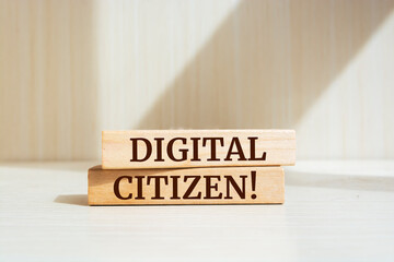 Wooden blocks with words 'Digital citizen'. Business, technology, internet concept. - obrazy, fototapety, plakaty